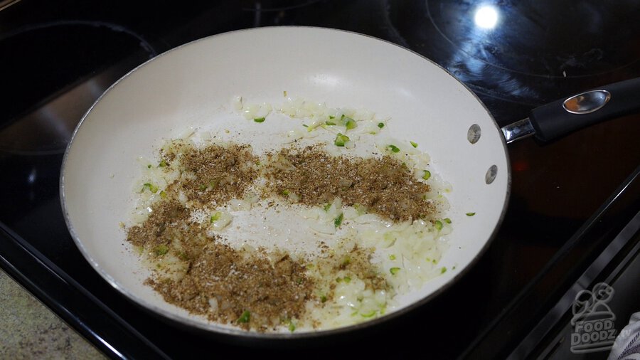 Taco seasoning is added to skillet mixture