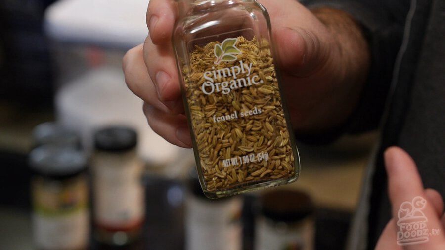 Jar/container of fennel seeds seasoning/spice