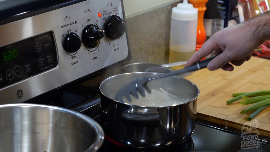 A pot boiling noodles