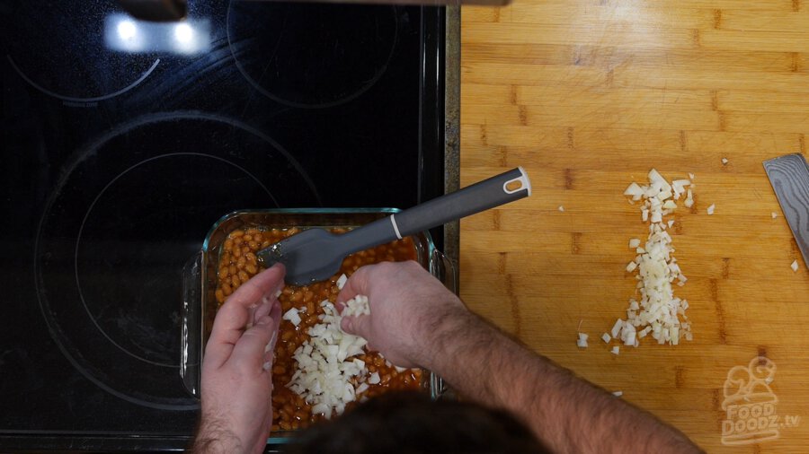 Chopped onions added to the baked beans