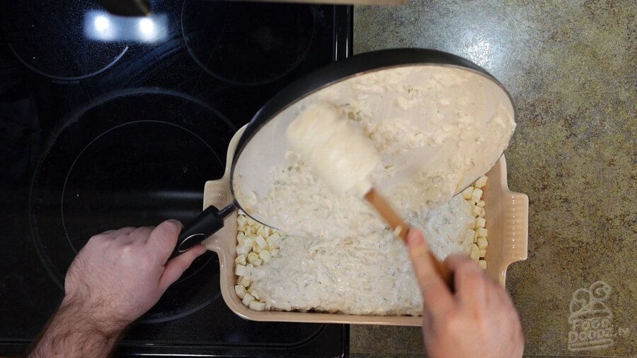 vegan cream of celery soup mixture poured over frozen hashbrowns