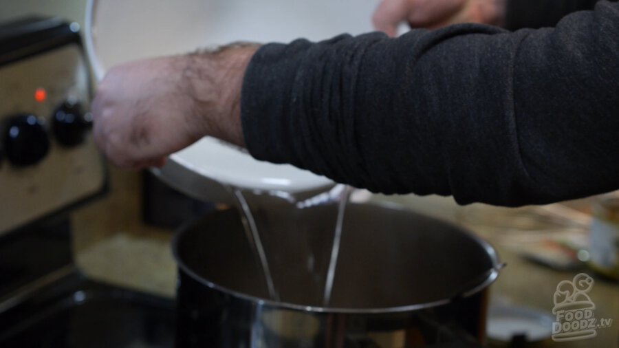 water being added to pot