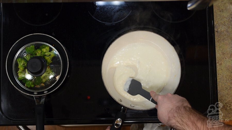 Simmering gravy being mixed