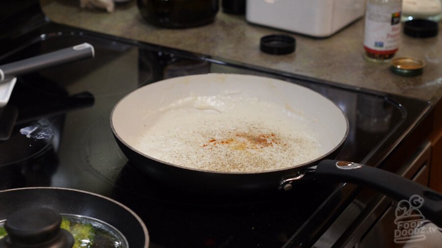 Garlic powder, cayenne powder, and black pepper added to gravy