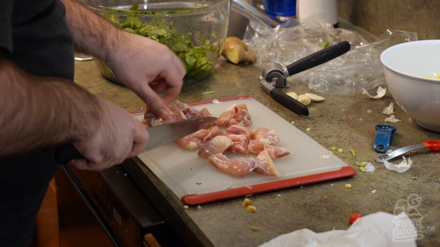 Bite sized raw chicken thighs