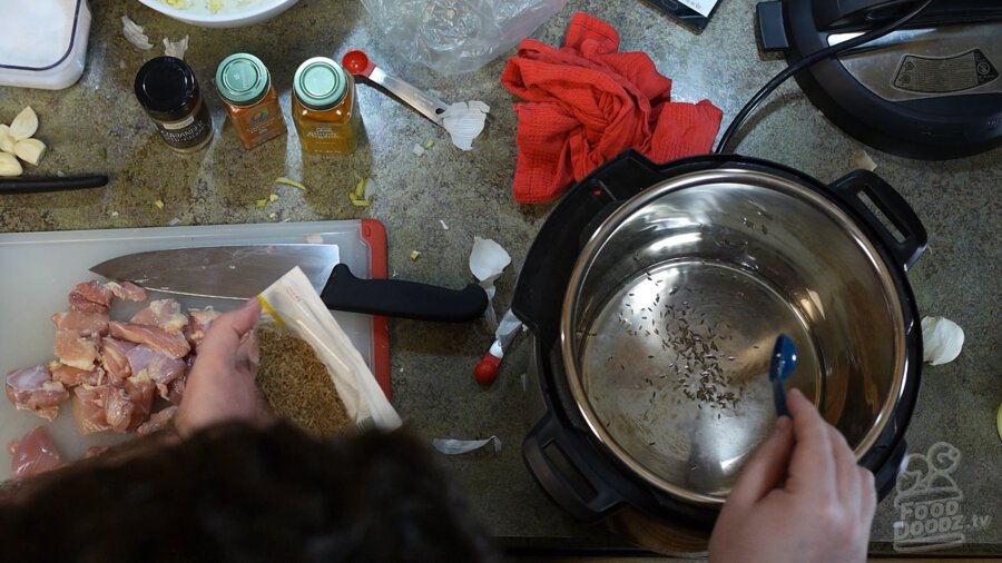 Cumin seeds added to oil