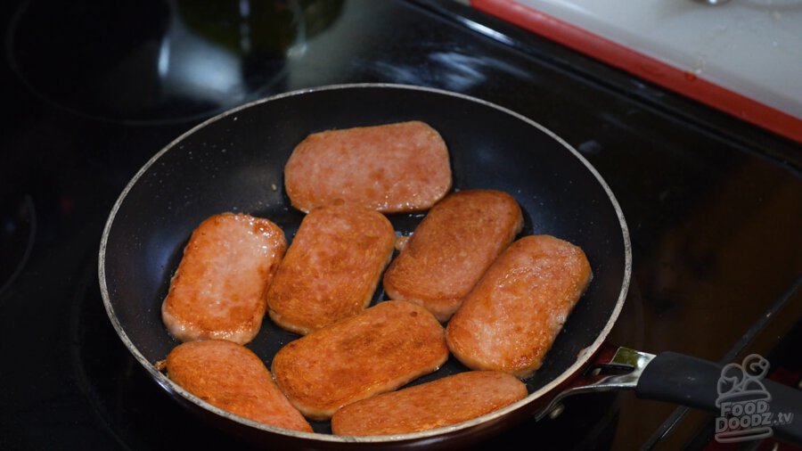 Pretty well browned spam slices