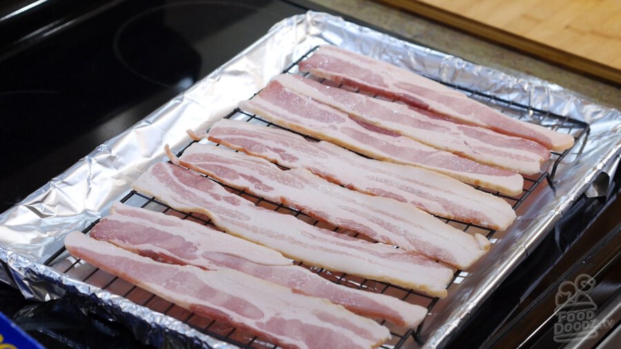 Lining baking sheet with bacon slices