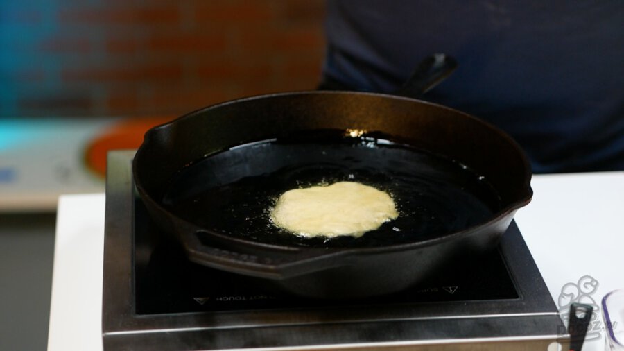 Fry bread dough just dropped into the oil