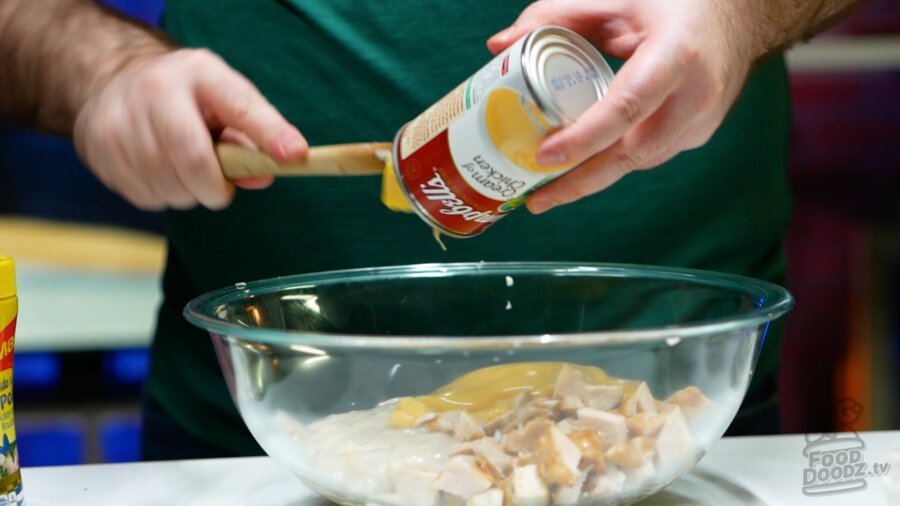 Cream of chicken being added