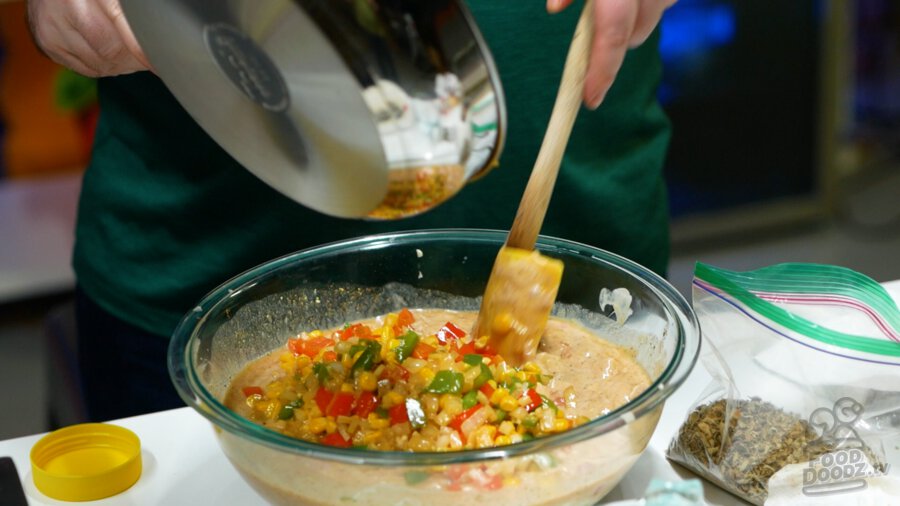 Cooked veggies being added