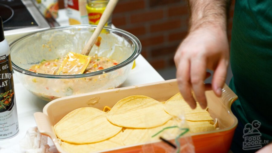 Covering the cheese with 5 tortillas