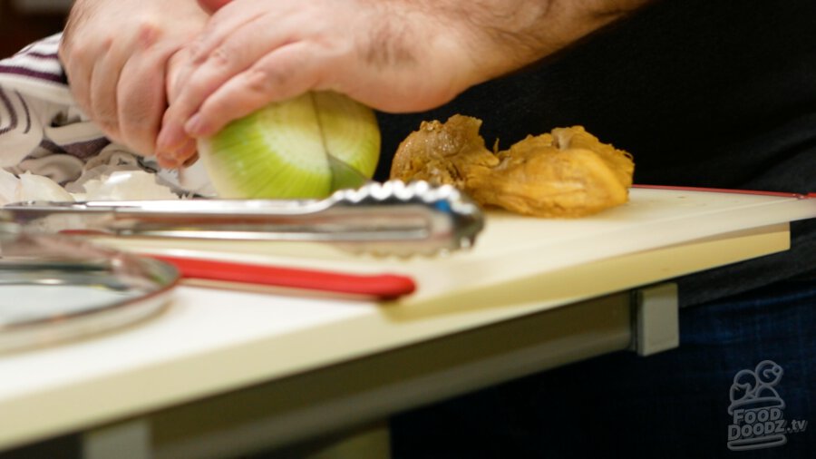 Cutting onion in half