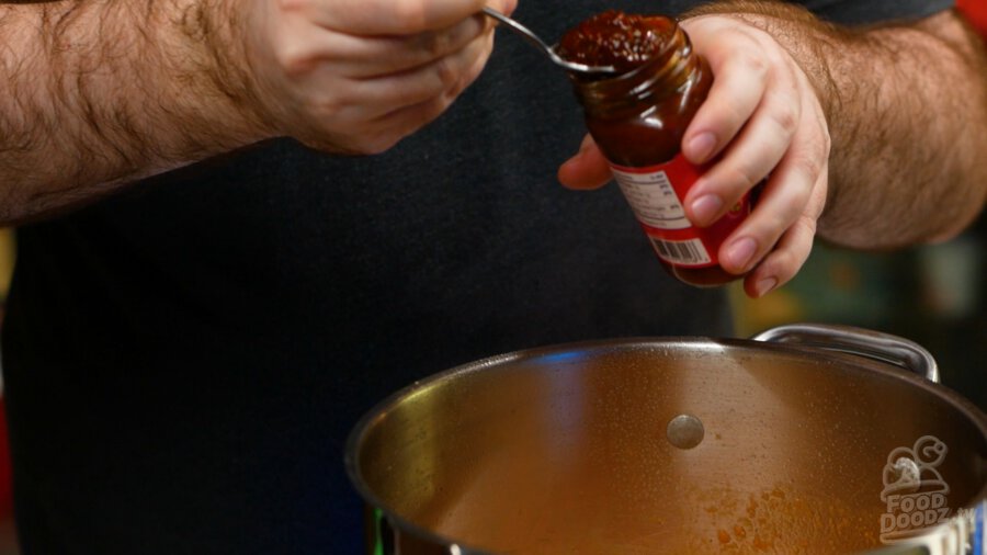 Adding chipotles to pot