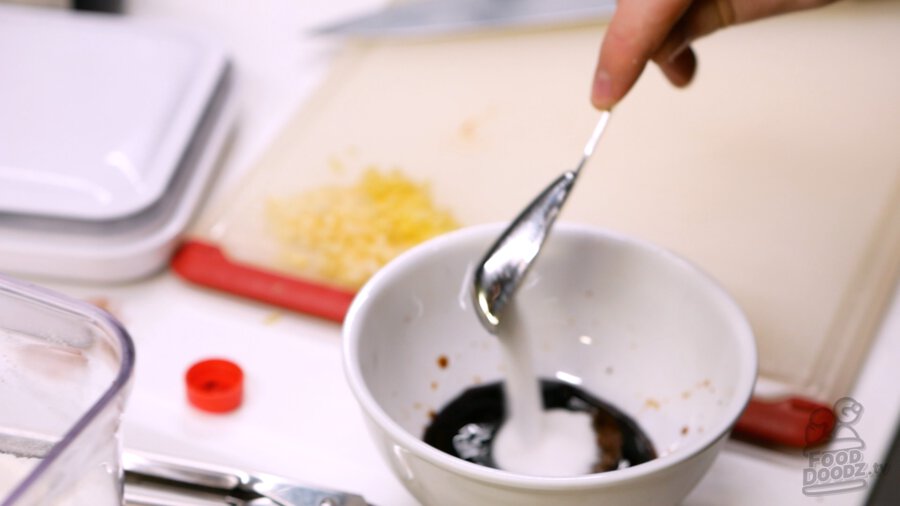 Adding sugar to bowl