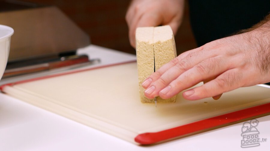 Slicing tofu in half