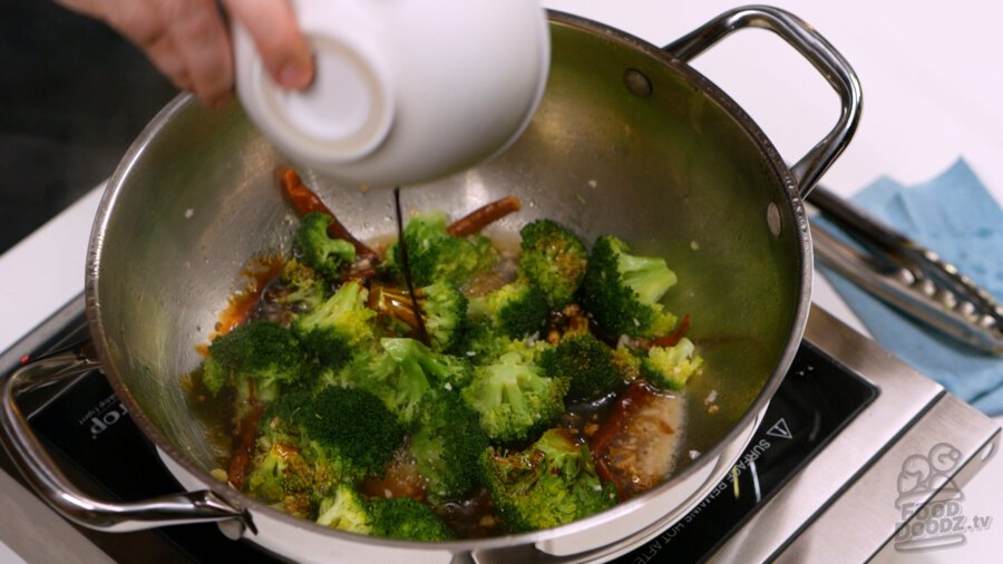 Adding sauce to pan