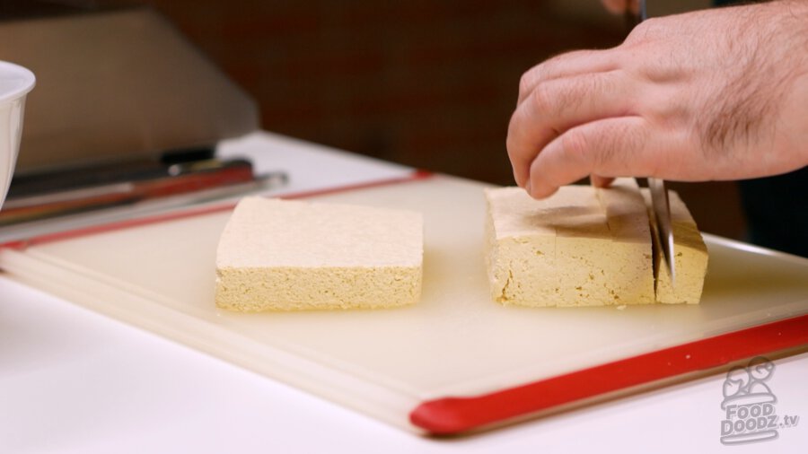 Cutting up tofu