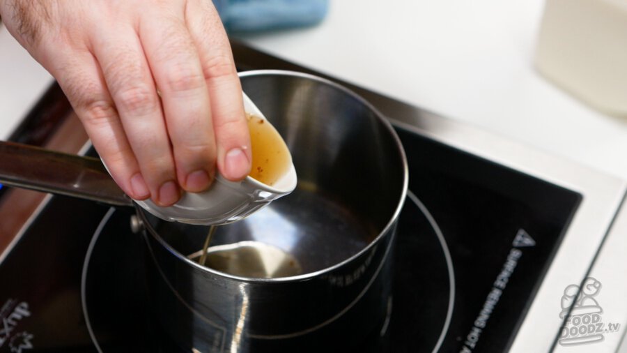 Adding bacon and sausage fat to sauce pan