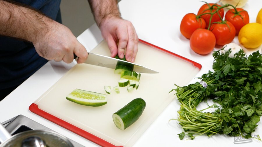 A cucumber chopped up into bite-sized pieces