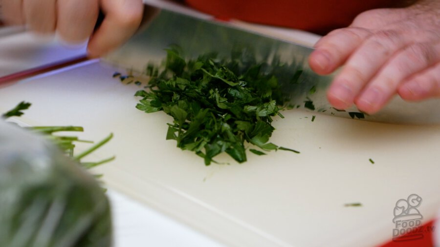 Finely chopping parsley