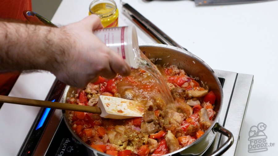 Adding water to the pan