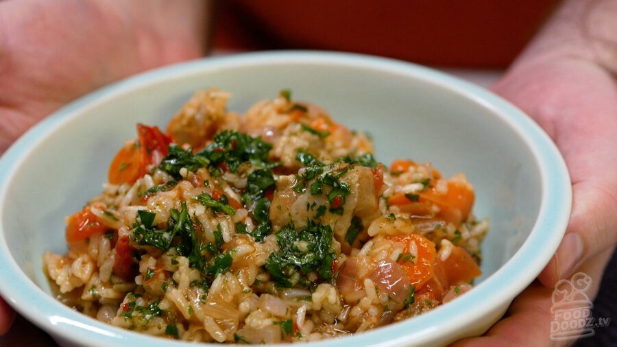 A bowl of the delicious chimichurri chicken rice