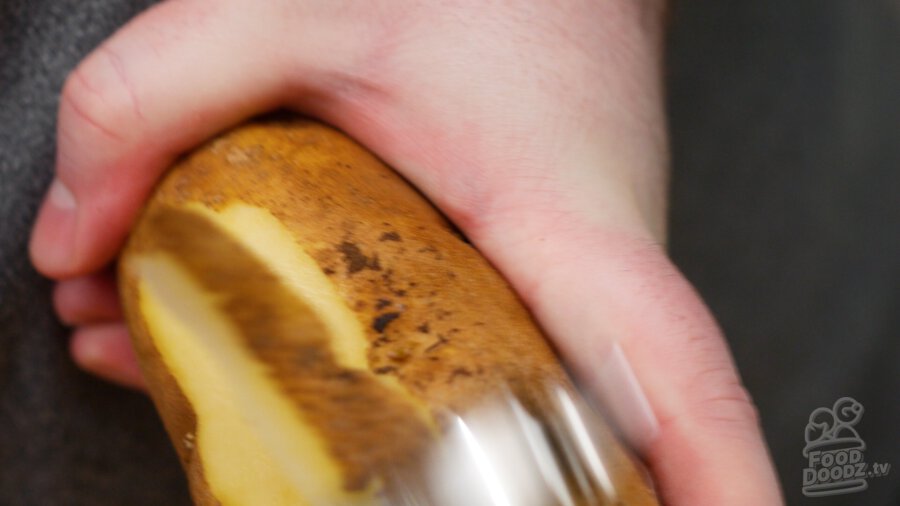 Peeling a potato