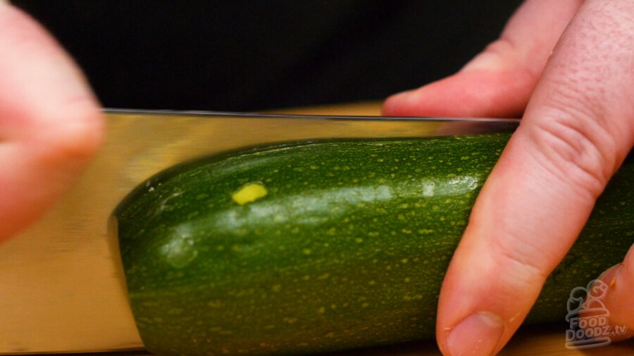 slicing zucchini lengthwise