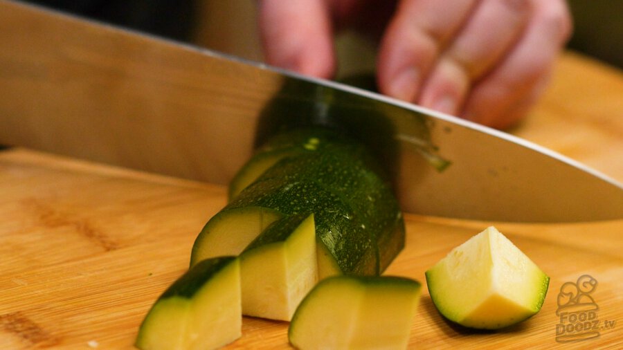 cutting up zucchini into half moons