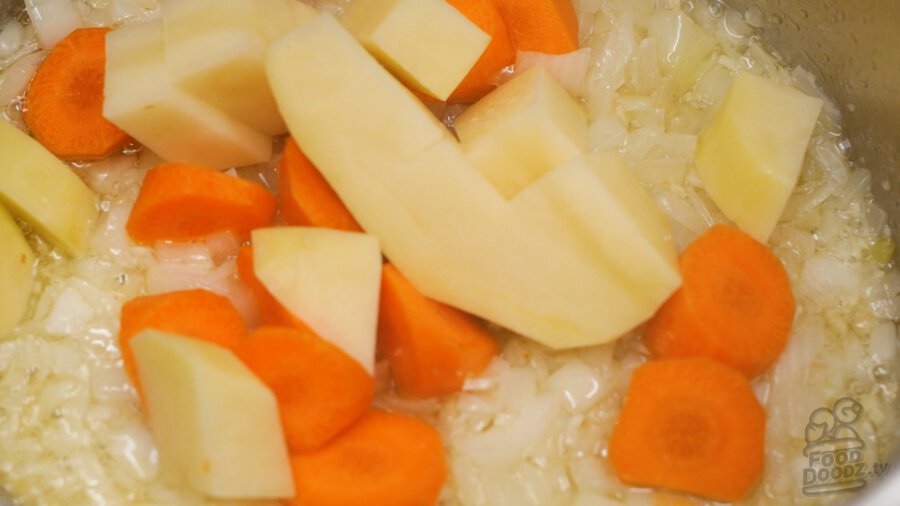 adding potatoes to pot