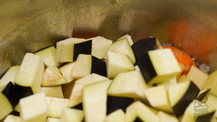 adding eggplant to pot