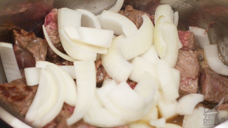 Adding sliced onion to pressure cooker