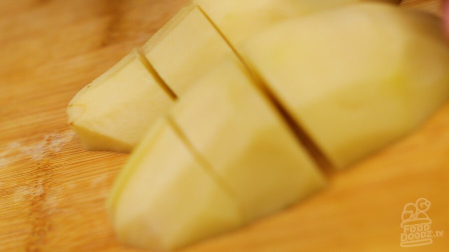 cutting potatoes up