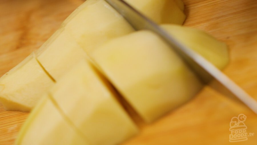 cutting potatoes up