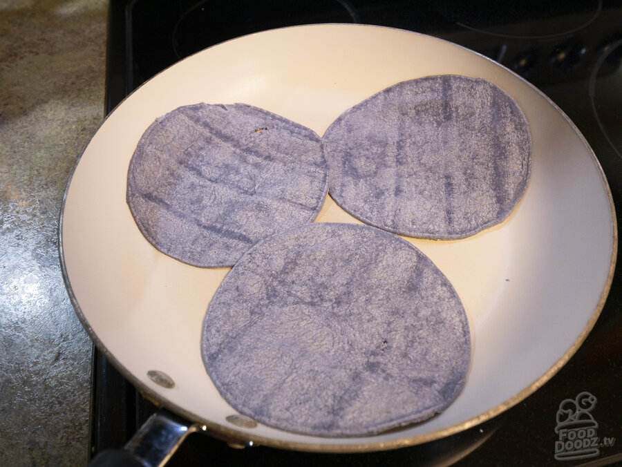 Heating corn tortillas in a non stick skillet